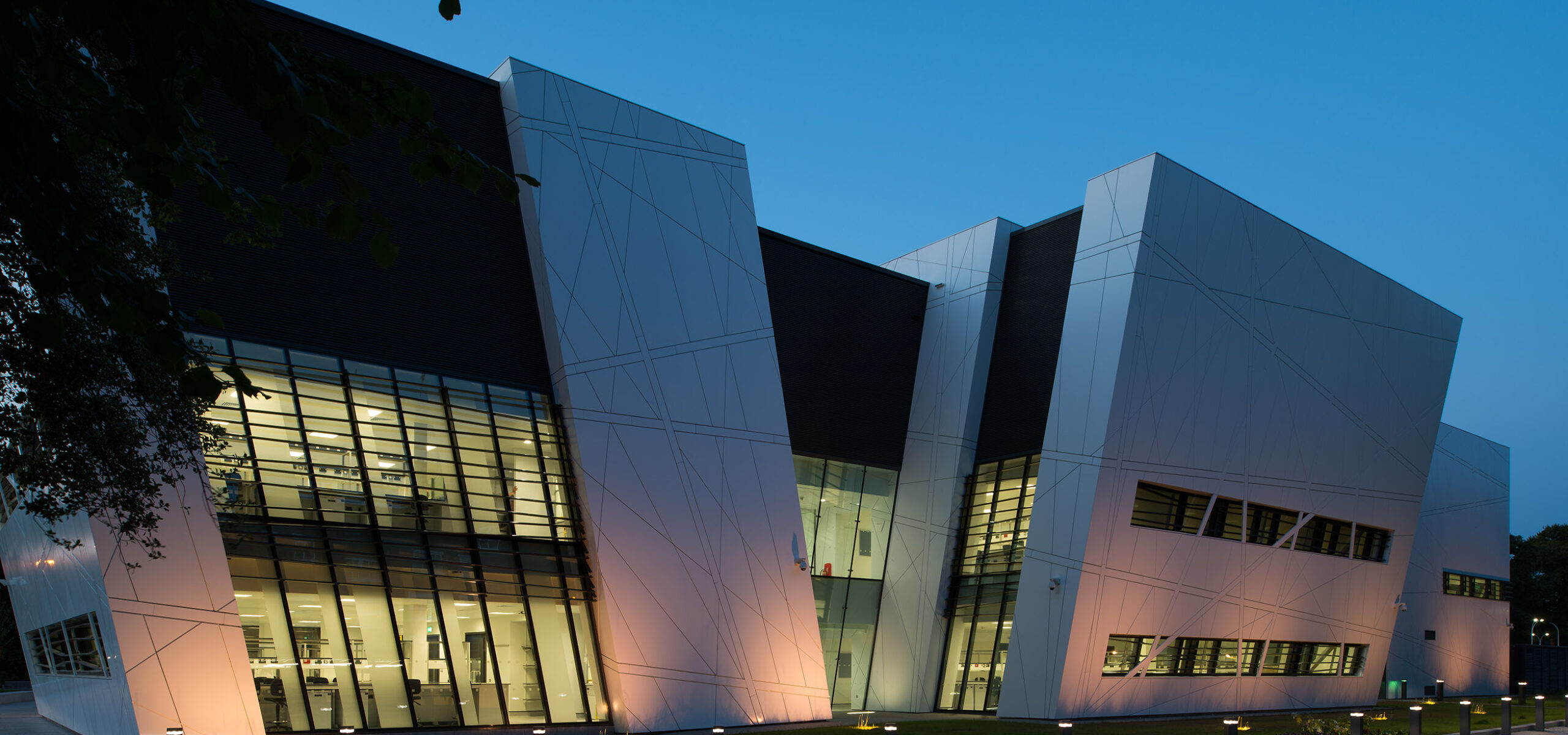Exterior of the Oglesby Cancer Research Building at nighttime