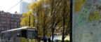 Manchester Tram next to map of Manchester