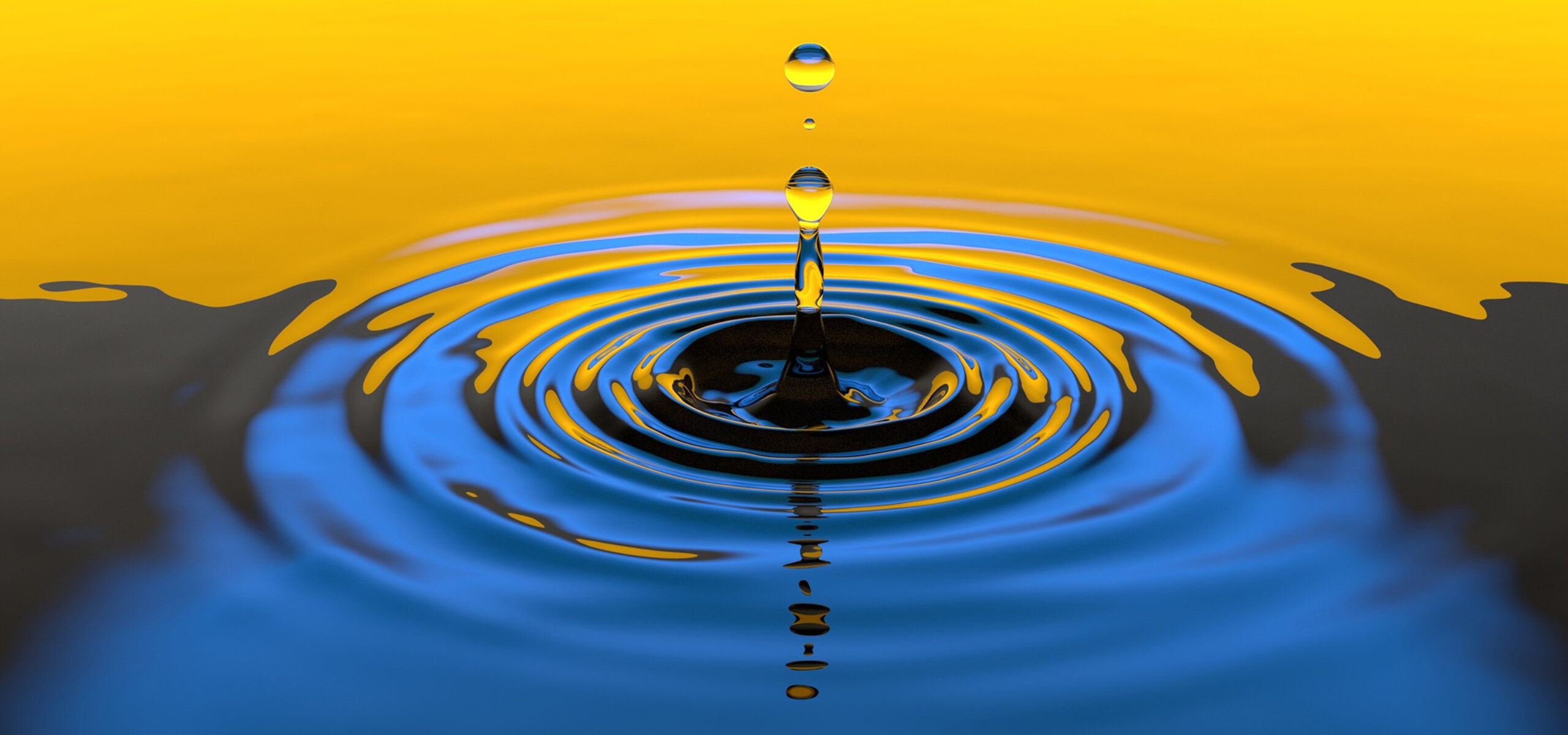 Drop of water causing ripples in water