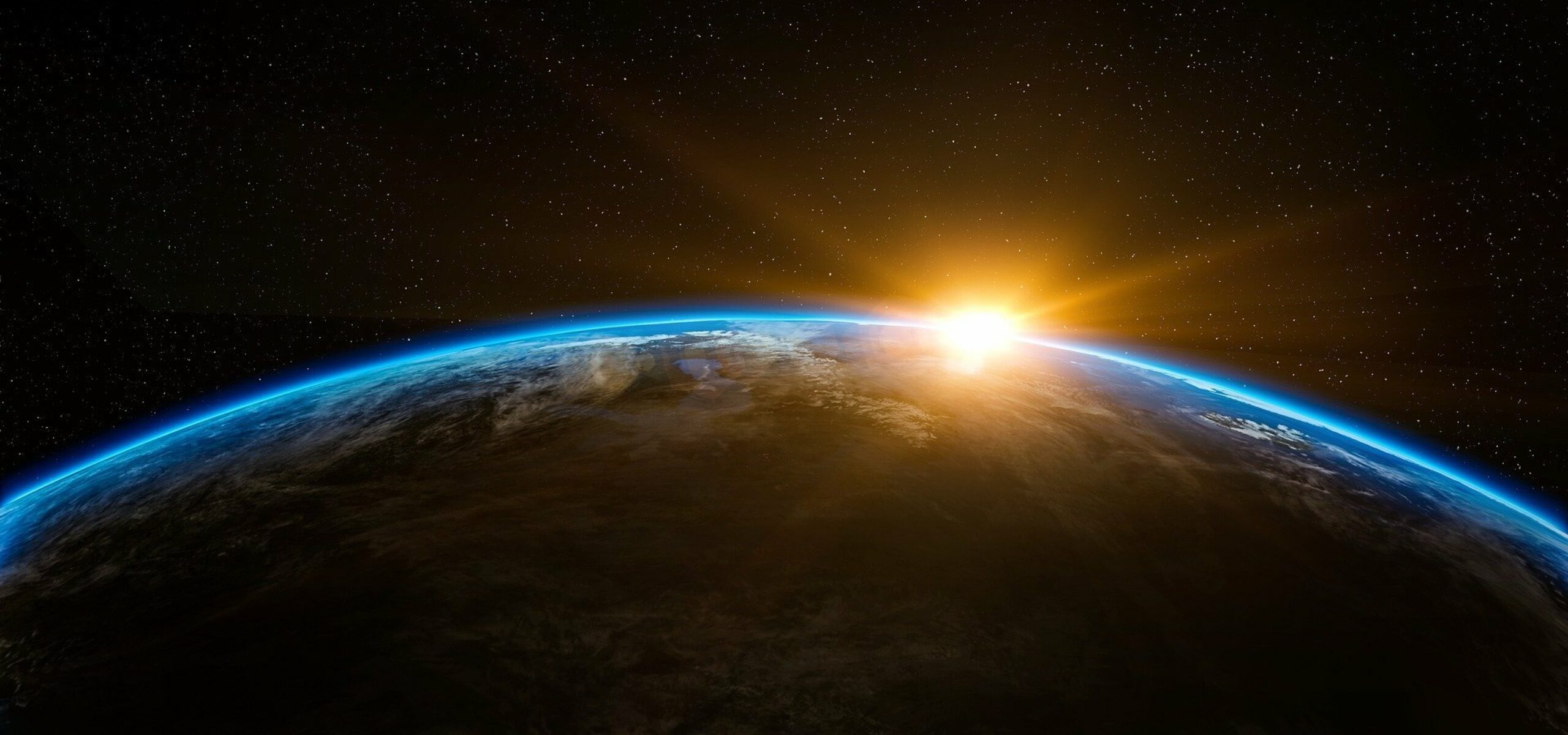 Sunbeams on Earth's horizon