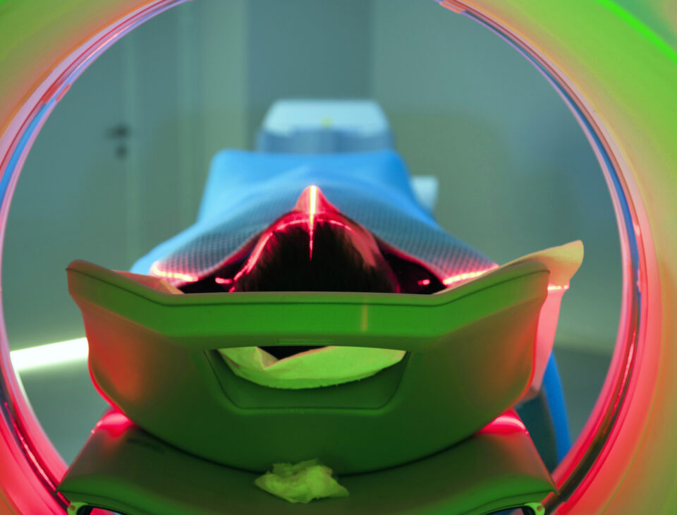 Patient laying on a CT scan platform