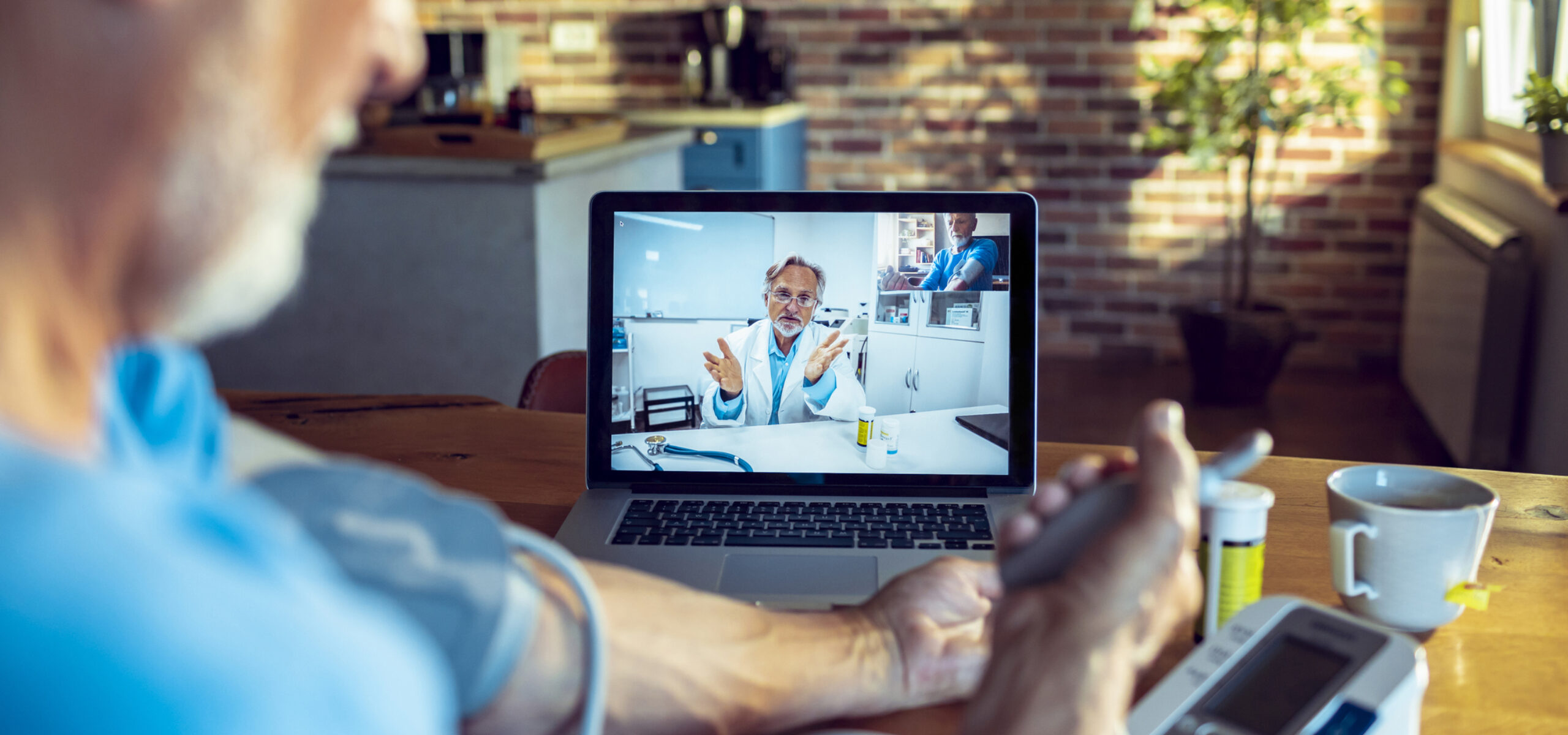 Senior Man consulting with his doctor online