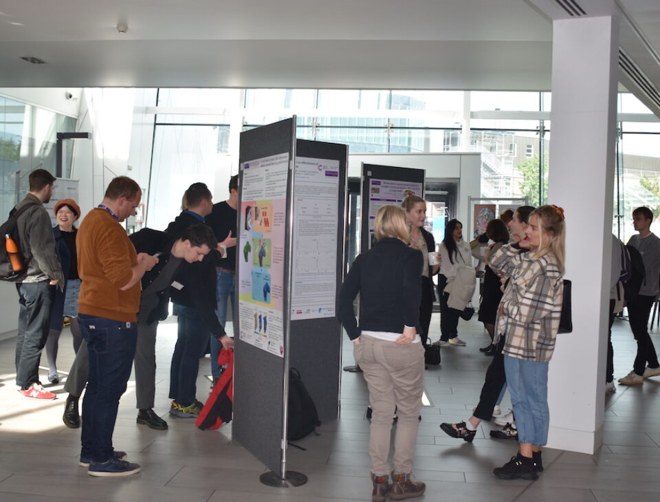 2022 PGR Showcase with researchers presenting posters
