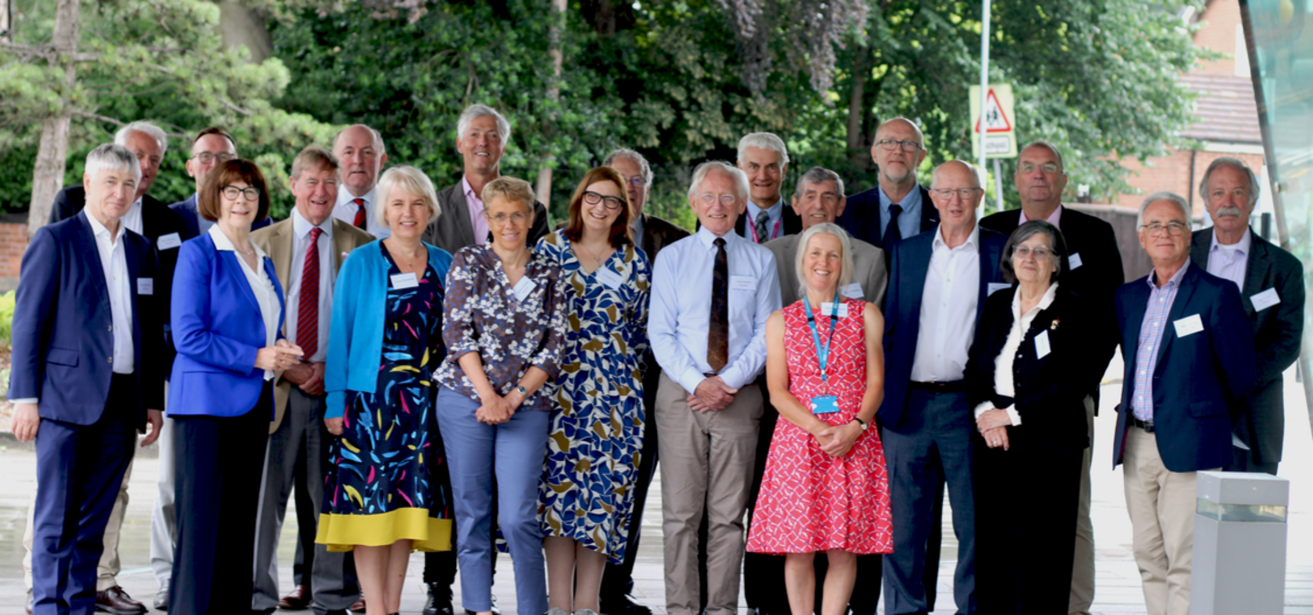 Professor Tony Howell and speakers from his Festschrift meeting outside of the Oglesby Cancer Research Building