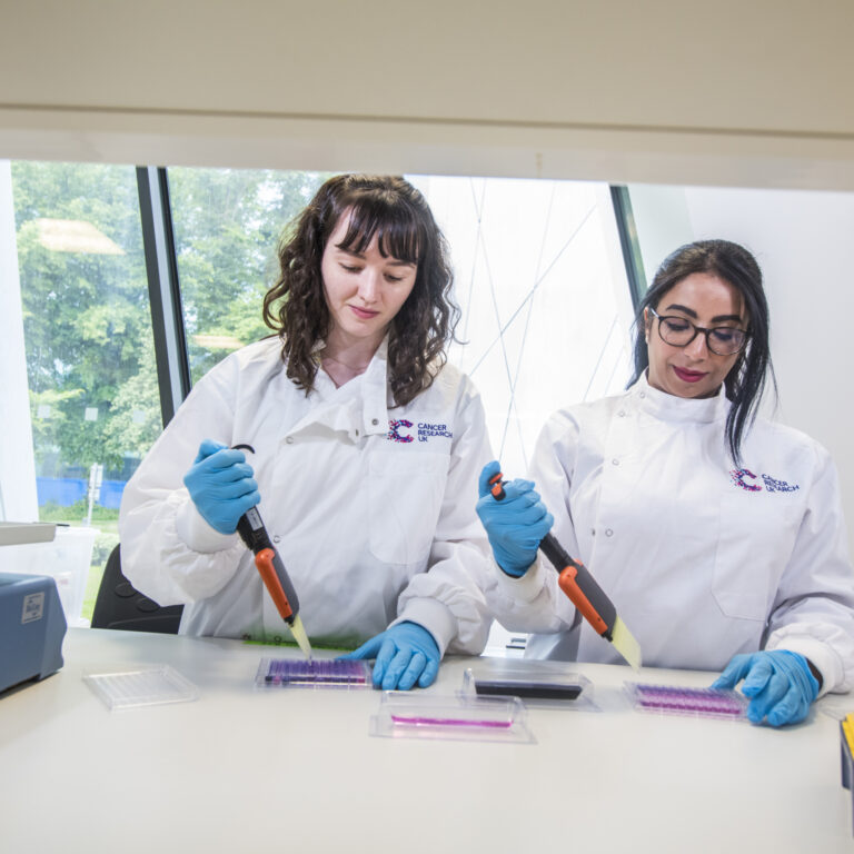 Two students in a laboratory