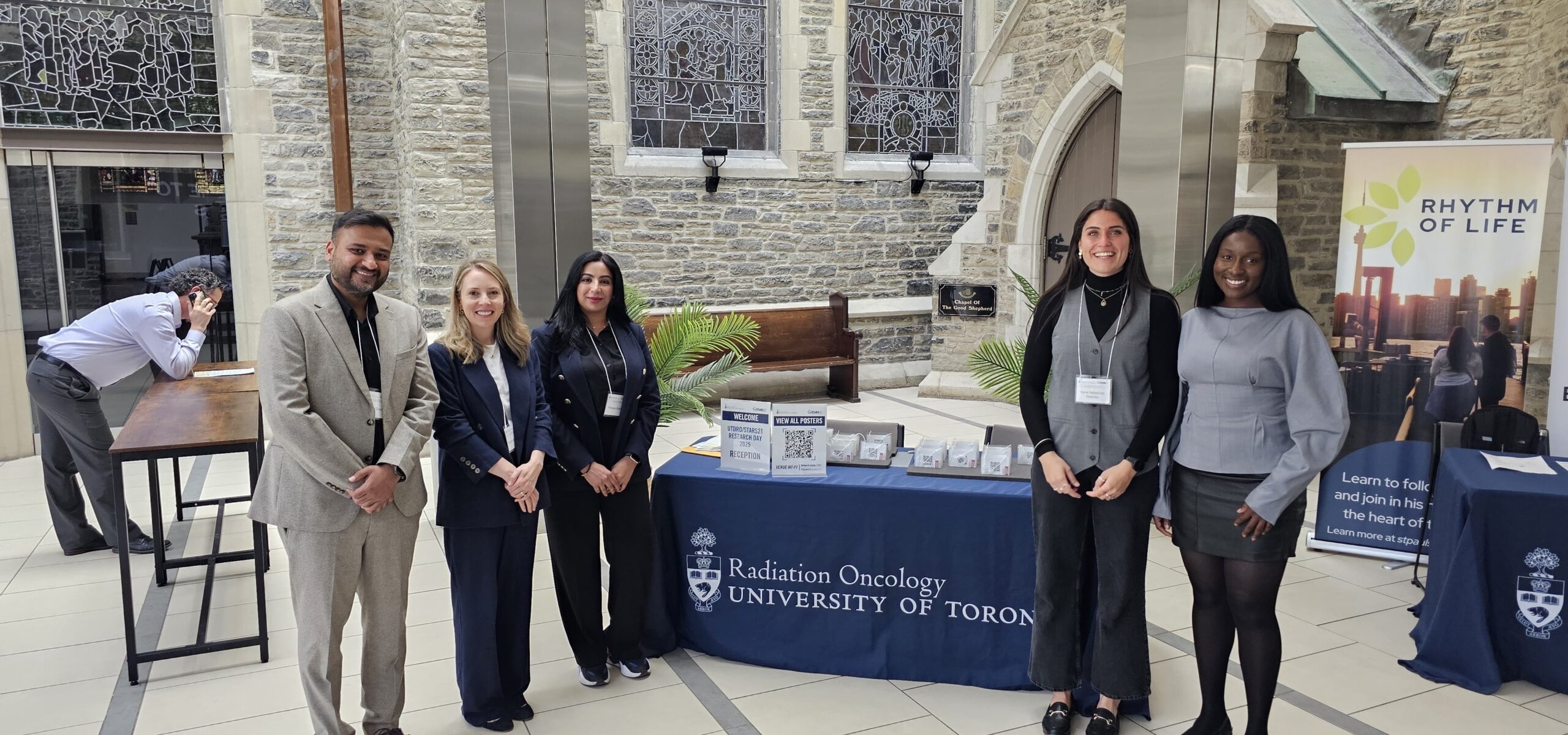 Scholars at the STARS21 registration desk inside The University of Toronto.