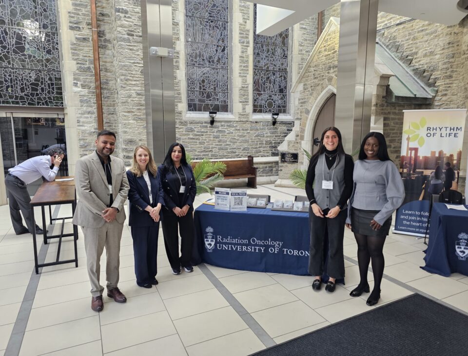 Scholars at the STARS21 registration desk inside The University of Toronto.