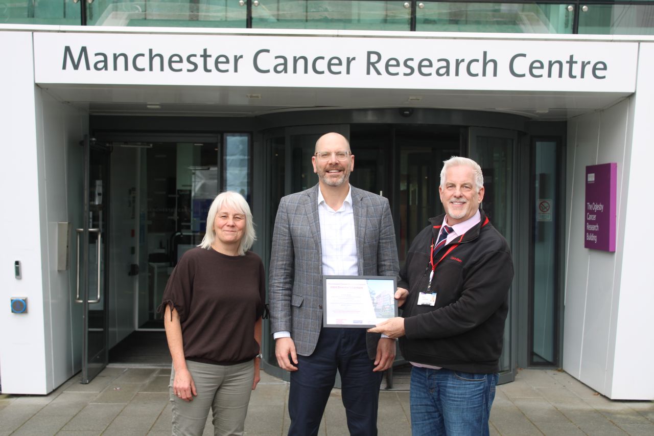 Dr Kent Mouw outsaide the OCRB in Withington with Professor Rob Bristow and Kaye Williams
